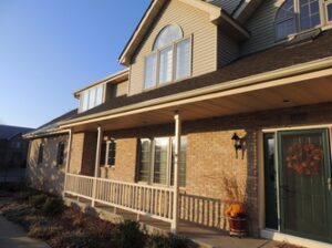 Replacement windows on a two-story home