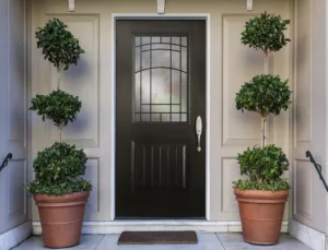 A sleek new entry door with decorative glass