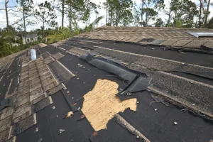Damaged roof with missing shingles 